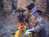 Vanessa Carrillo using a standard theodolite