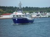 THIS WAS OUR WHALE WATCHING BOAT COMING OUT TO GET US AT THE WHARF