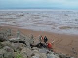 LOW TIDE AT THE SAME PLACE-WATERS EDGE IS A QUARTER MILE OUT TO SEA