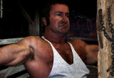 a burly stocky hairychest rancher redneck hunk.jpg