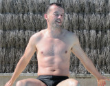 cute handsome guy sitting in pool.jpg