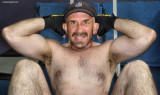 hairy muscle stud doing situps.jpg