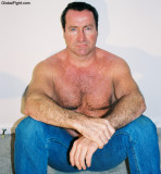 beefy older men posing shirtless.jpg