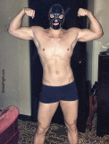 leather muscle jock wearing mask.jpg