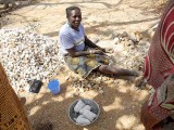 Now stones are taken from the former gold mine and are cut into pieces, Laongo, Burkina Faso