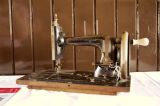 Contemporary sewing machine (hand driven)