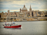 valletta view and ferry boat