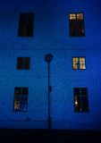 Windows on blue wall