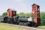 Canadian Pacific Railroad Steam Locomotive in front of the Water Tower and Sand Tower (1904)