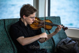 Violinist on ferry 
