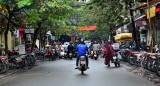 busy narrow street in Hanoi, Vietnam 