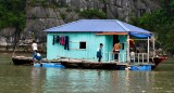 life at Cua Van floating village, Dau Go Island, Ha Long Bay, Vietnam  