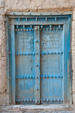 Engraved Blue wooden door