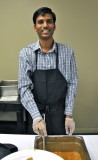 person serving food at Indian Night at ISU _DSC7233.jpg