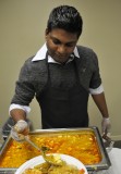 person serving food at Indian Night at ISU _DSC7238.jpg