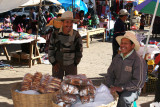 Vendedores de Pan en la Plaza Central