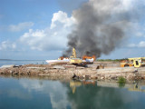 Customs burning illegals boats
