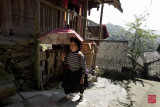 Yao lady walking home in Da zai, GuangXi province.