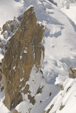 Climbers on Cosmiques in deep snow
