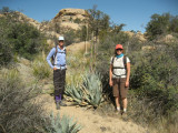 Allison & J next to a budding agave