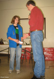 Jeff Skevington giving Dawn Seburn a prize for her Macoun Club exhibit