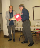 Dr. Paul Catling receiving his Honorary Membership  in the OFNC from Ken
