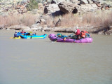 ...a group of rafters<BR>floating down river