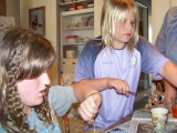 Taya & Kaelyn get into<BR>coloring Easter eggs