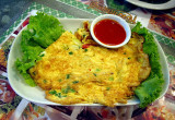 Omelet with chili sauce