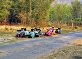 Farmers waiting for a bus