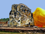 Reclining Buddha image with supplicant