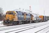 GP38-2s 1801 and 1802 on freight service in Moosonee 2009 March 27
