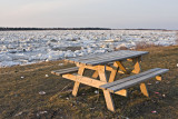Picnic table beside ice