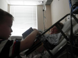 Zach reading book to Baby Joshua