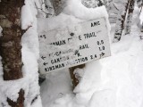 140 Kinsman ridge sign in deep snow.