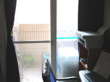 Balcony off my room, with my dryer and miscellaneous crap