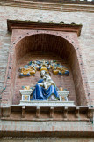 Virgin Mary Statue at gate to Abbey Monte Oliveto Maggiore