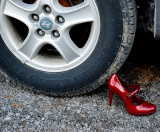 Red Shoe Under Tire