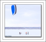 Para-Skiers Watching And Helping One Another