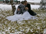 Snow provides a bit extra for wedding photos, Panfilov Park