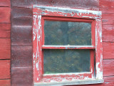 red framed barn window