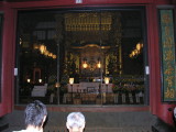 The shrine inside this more ornate temple, not as ancient as others wed seen down south.