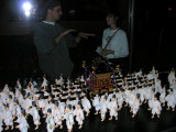 A miniaturized version of the procession, with Keith explaining it all to Becky on the other side.