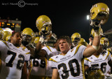 Tech OL Jason Hill and LB James Liipfert celebrate with the team in front of the north end zone student section