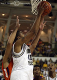 Yellow Jackets G Glen Rice Jr. lays the ball up from under the basket