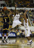 Tech G Lewis Clinch leaps high to disrupt a pass