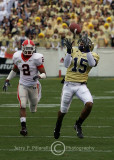 Tech WR Correy Earls attempts to haul in a bomb while Georgia SC Asher Allen trails the play