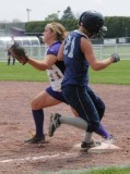 KellyE Squeezes It for the Out!