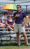 Coach (and her folks under the umbrella)