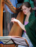 Street performer, harp